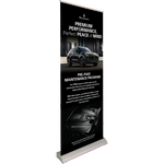 A retractable banner featuring a car image and text that highlights a Pre-Paid Maintenance Program. The banner is black with white and green text and features a digital imprint of a car.