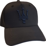 A black polyester cap with a blue brim, featuring a 3D embroidered Trident logo on the front and an adjustable velcro strap closure.