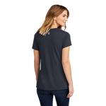 Back view of a woman wearing a navy t-shirt with 'MASERATI' logo in the yoke.